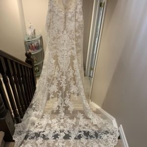 Brand new unaltered wedding dress